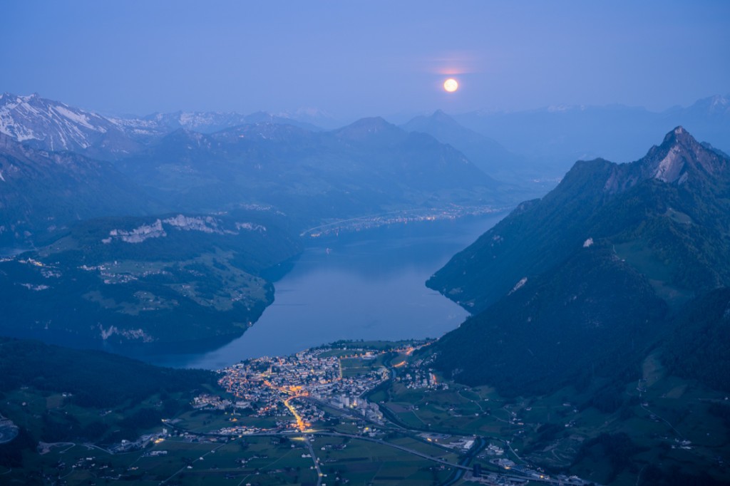 Blue hours on the Grosser Mythen with the moon setting over Lake Lucerne