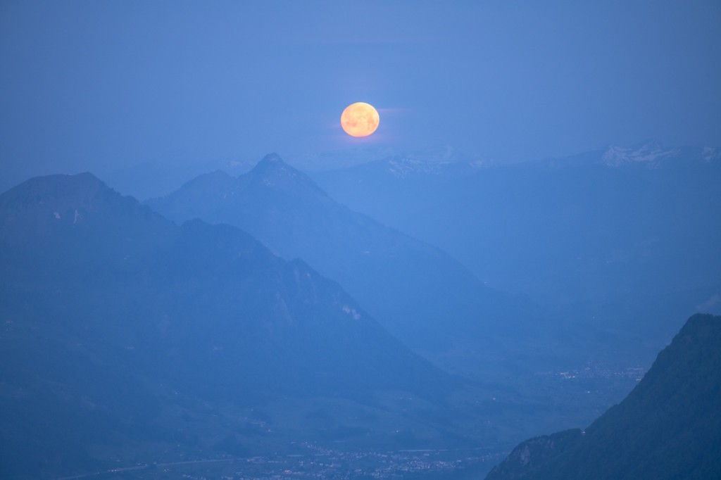 Detail of the setting moon over lake Lucerne