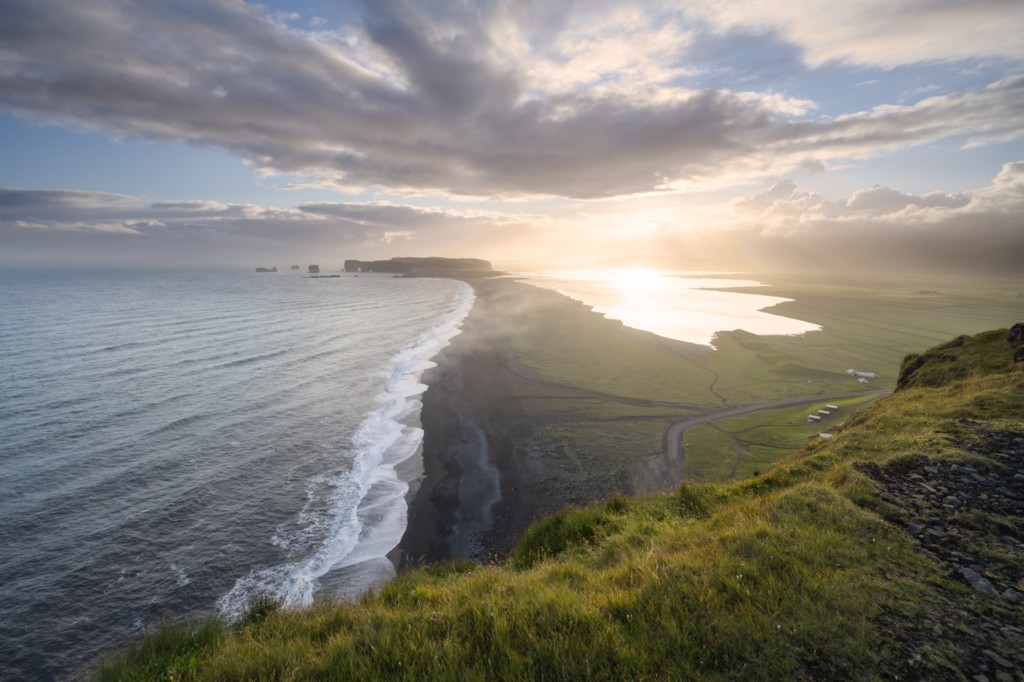 Sunset over the Reynisfjara cliffs and Dyrholaey