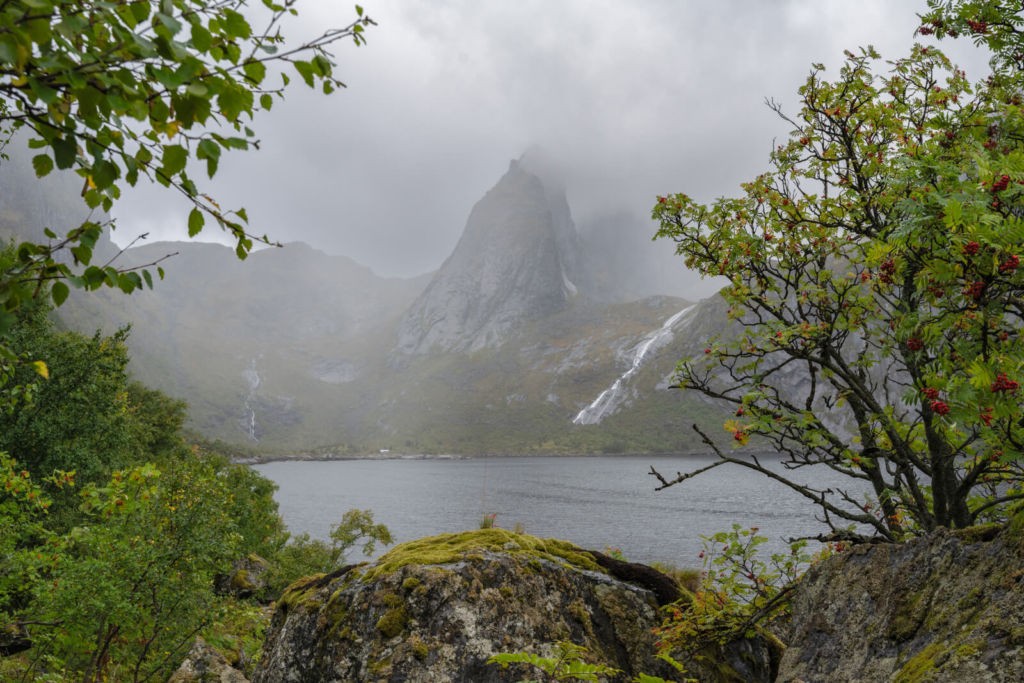 Raining over a norwegian fiord on the trail to veinestinden