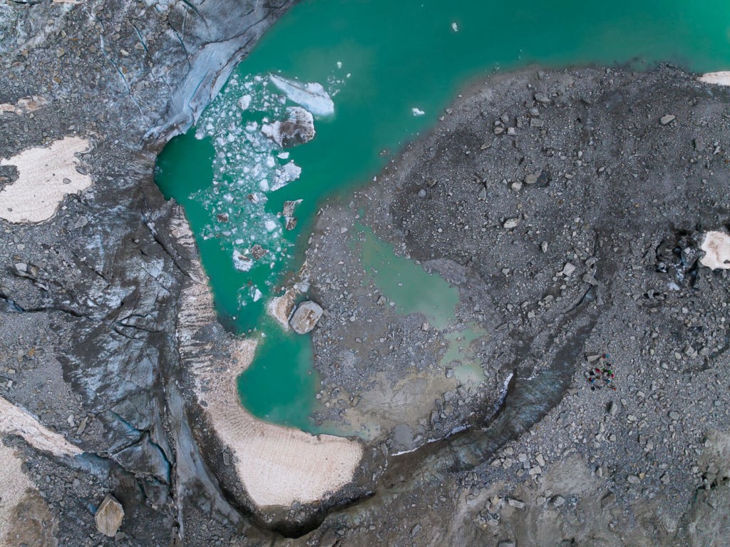 The Sidelengletscher and Alber Heim Hütte Hike aerial photo of the glacier and its glacial lake