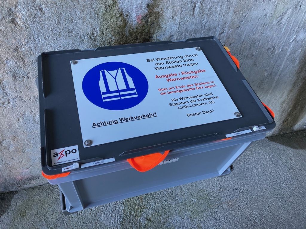 Box containing high visibility jackets