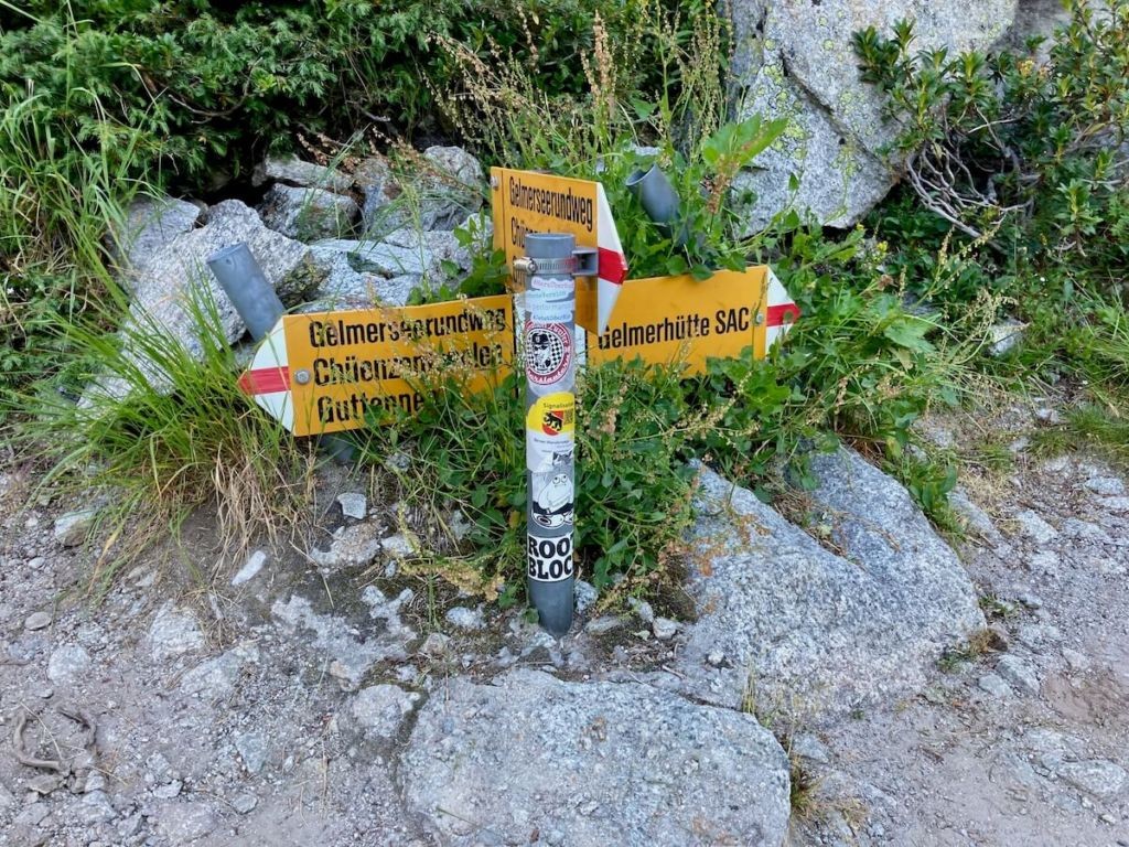 trail signs on a trail in Switzerland