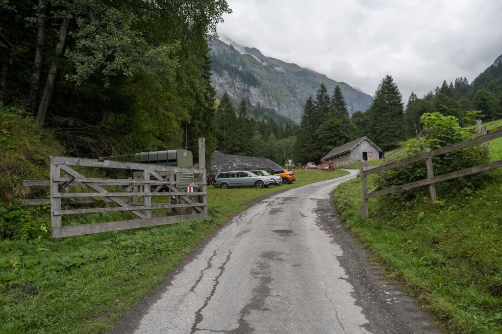 Beginning of the trail on a paved road in the Swiss alps