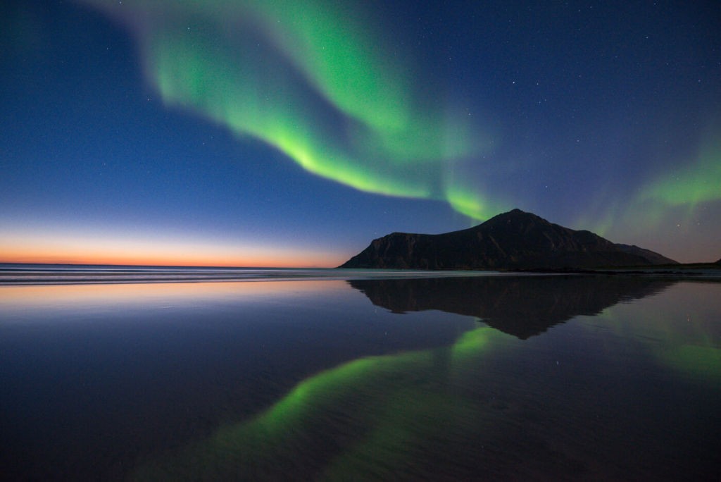 How to see the Northern lights, Aurora borealis reflected in the sea at low tide