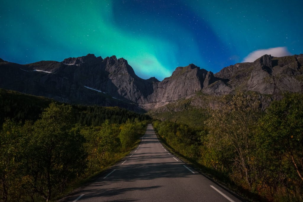 Aurora Borealis above a road in norway