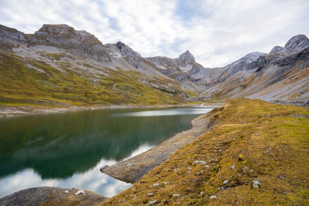 Glattalpsee, an alpine lake surrounded by mountains