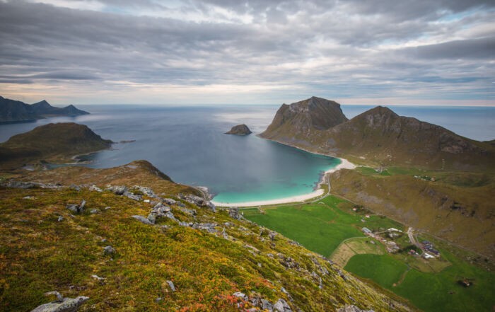 Hike to Holandsmelen, view from the top of the mountain toward the white sand beach of Haukland