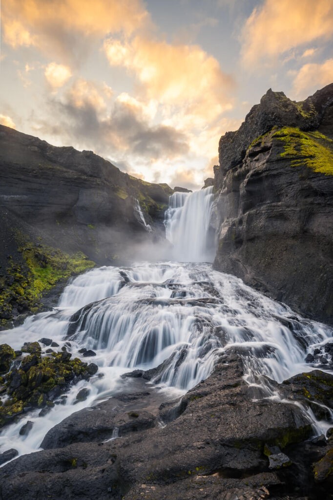 Ofaerufoss a stunning waterfall in the highlands of iceland at sunset