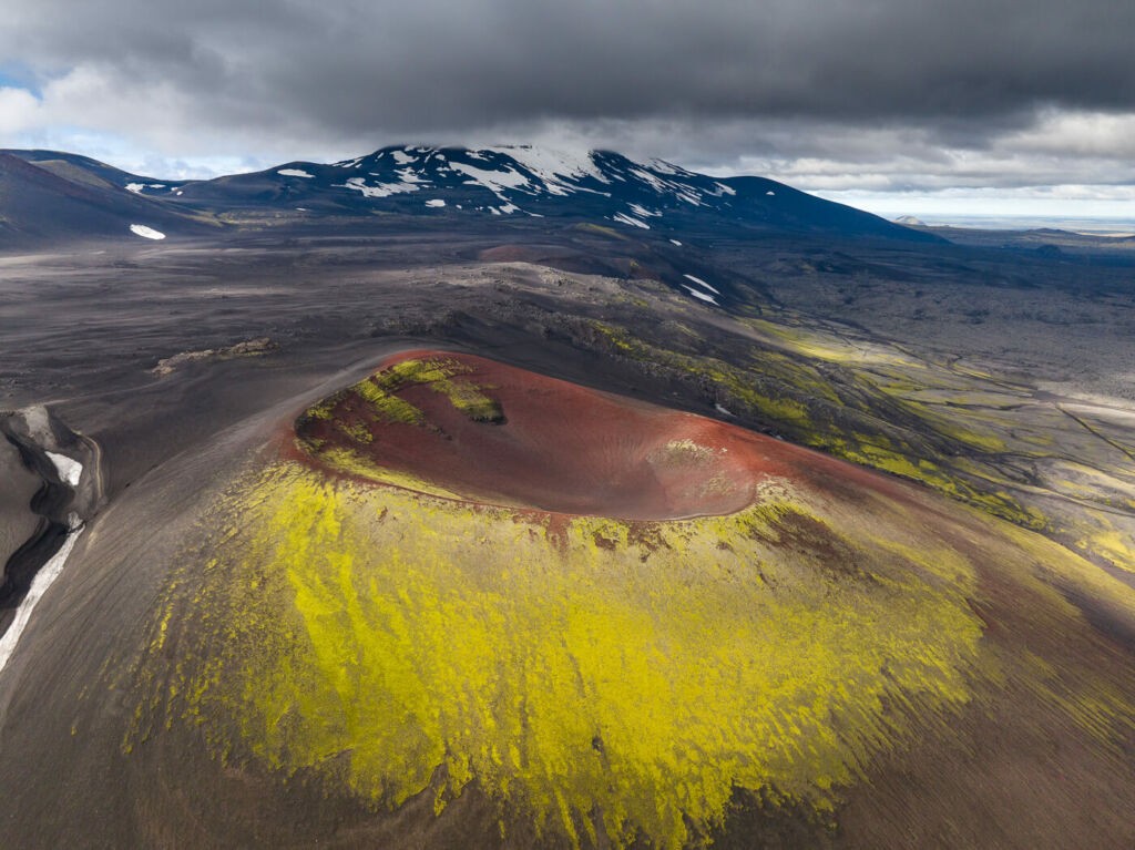 Drone photo of the Apple crater in Iceland with Hekla in the background 