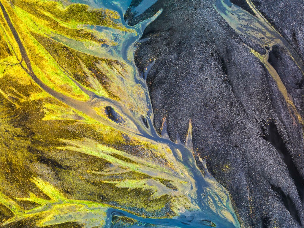 Flying Drones in Iceland image of a colourful river taken from a drone.