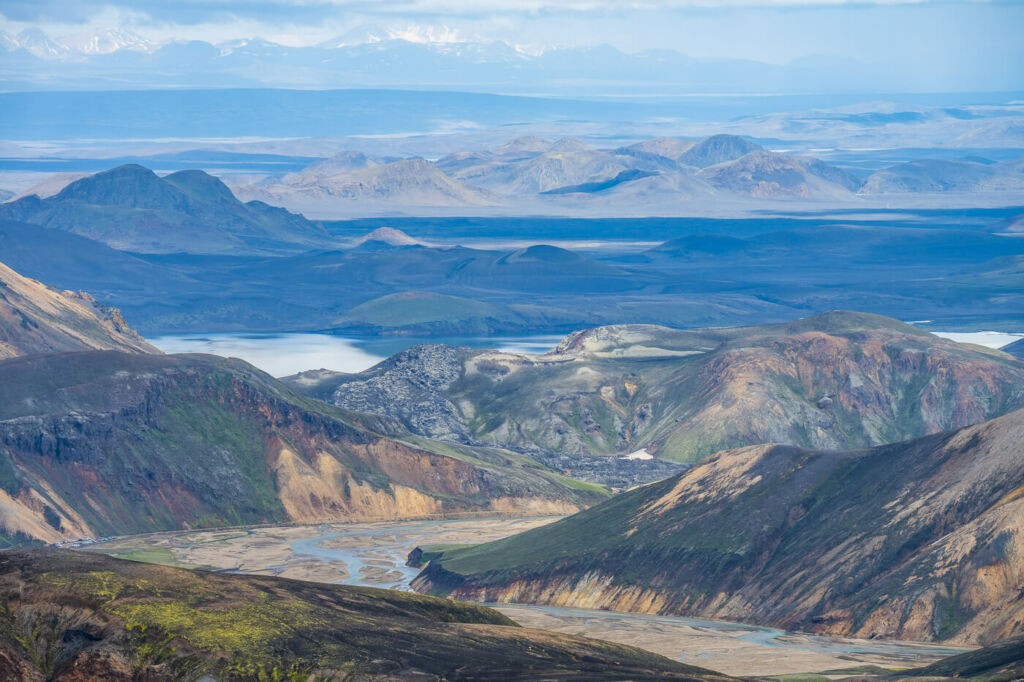 View over the vast expanses in the highlands of Icelands with rivers mixing with hills.
