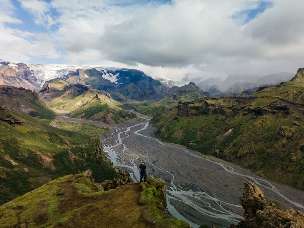 Hiker looking at the landscape around the Krossa River in Iceland
