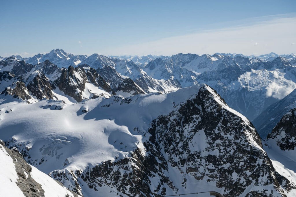View from the Titlis Glacier over the surrounding snowy peaks of the swiss alps