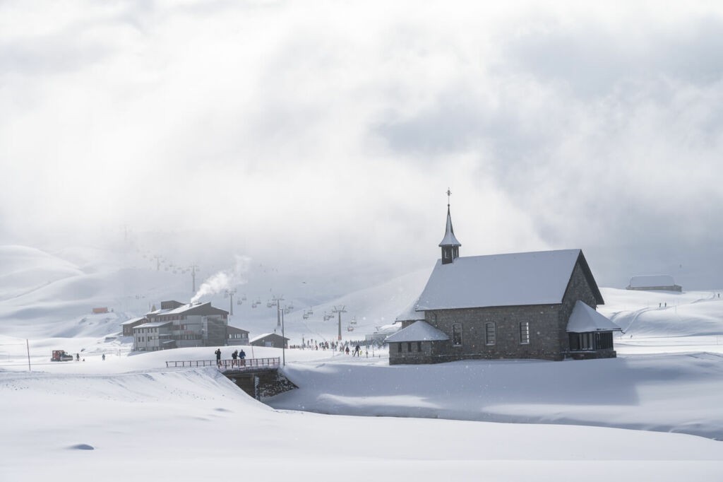 The Melchsee Chapel surrounded by snow