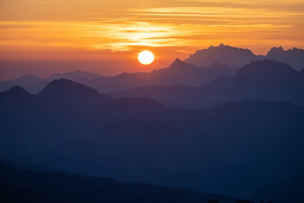 The sun rising above the Swiss Alps