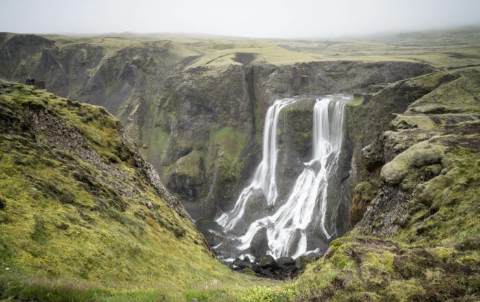 Fagrifoss the beautiful waterfall on a foggy day