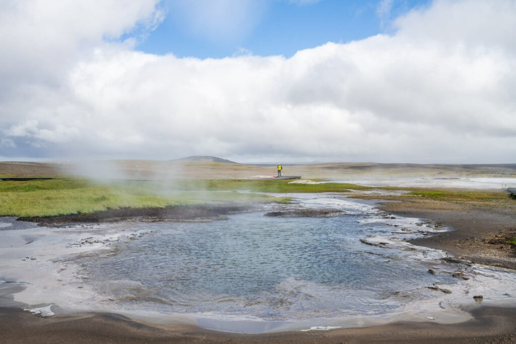 Big hot, steaming hot spring in the highlands of iceland