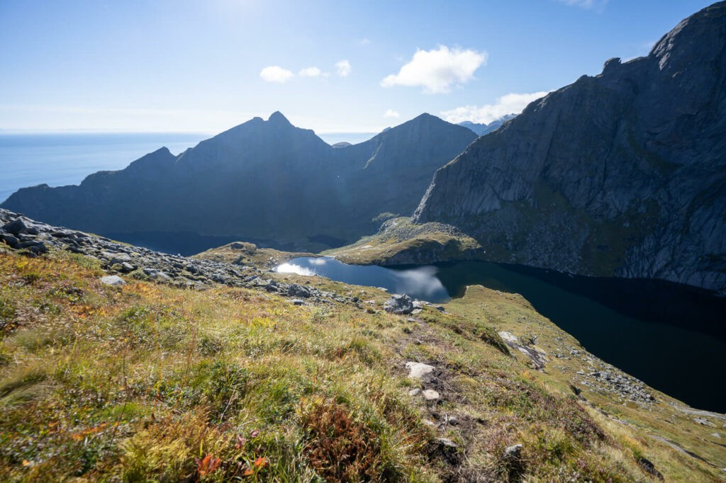 Sun on the mountains in the Lofoten Islands during a hike