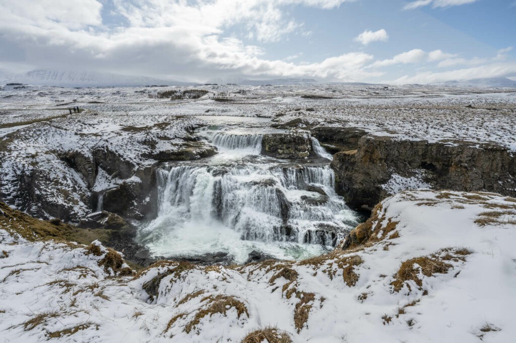 Reykjafoss waterfall in north Iceland surreounded by snow