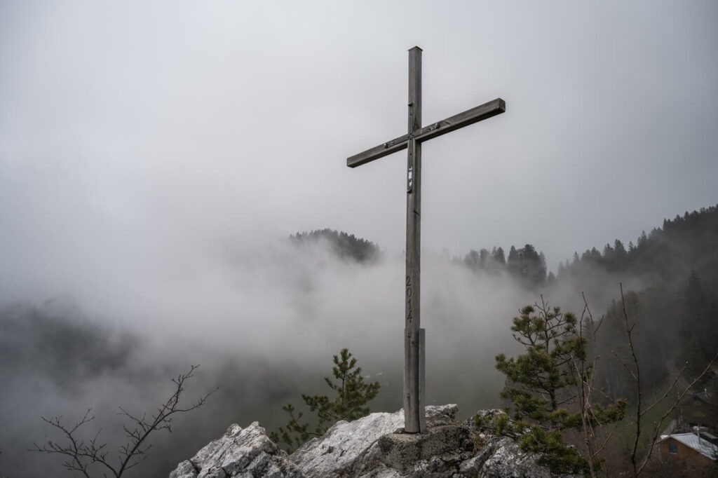 The Cross on the Rigi Stockhflue Summit on a cloudy day