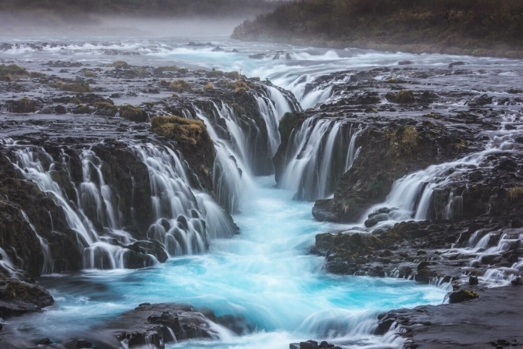 The Brúarfoss Waterfall and it sblue water whic can be admire during a hike