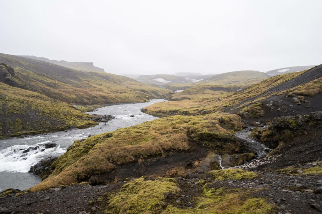 desolated landscape in the fog in Iceland along the Skoga river