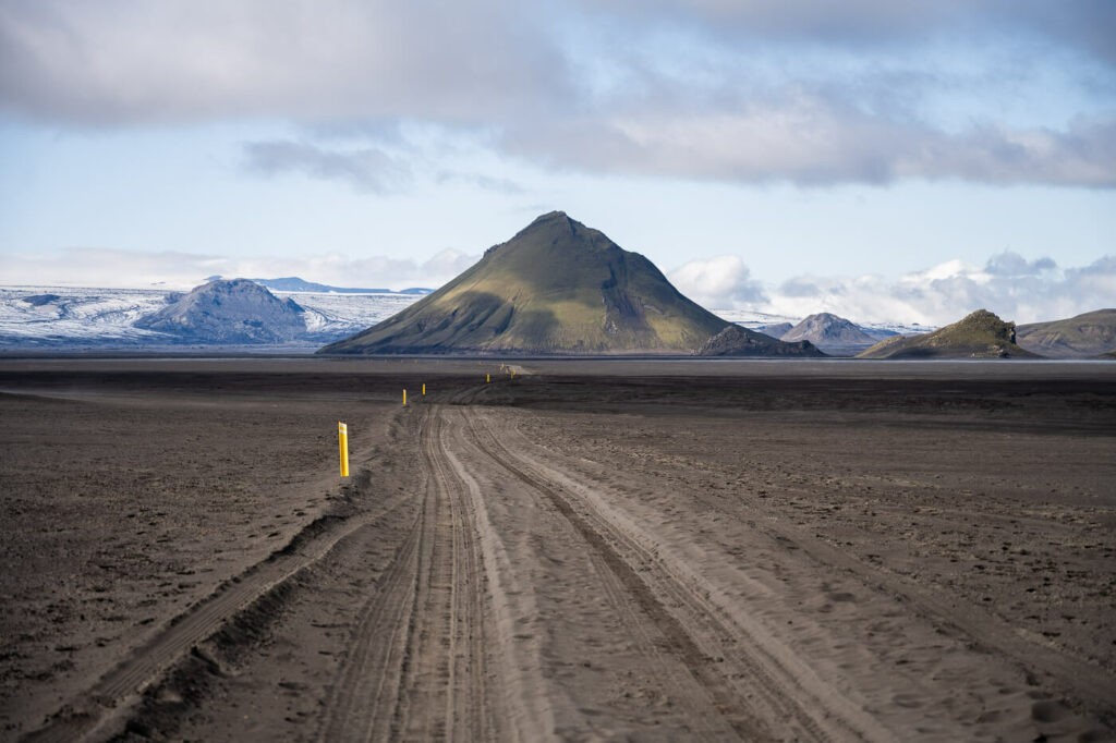 Road f210 in the highlands of iceland with Mount Mælifell in the background.