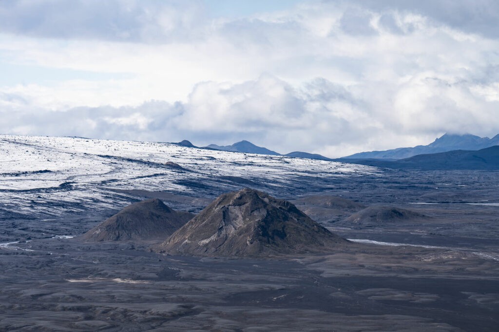 Mountain in the black Maelifelssandur plains next to the Mýrdalsjökull glacier