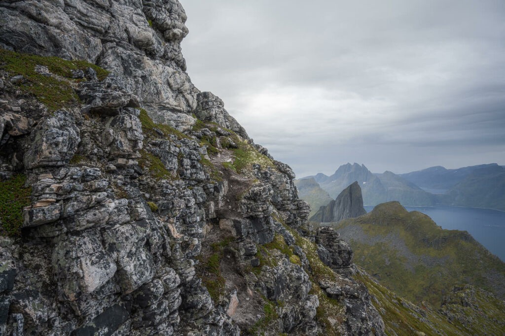 Exposed hiking trail on the side of Inste Kongen on the Island of Senja