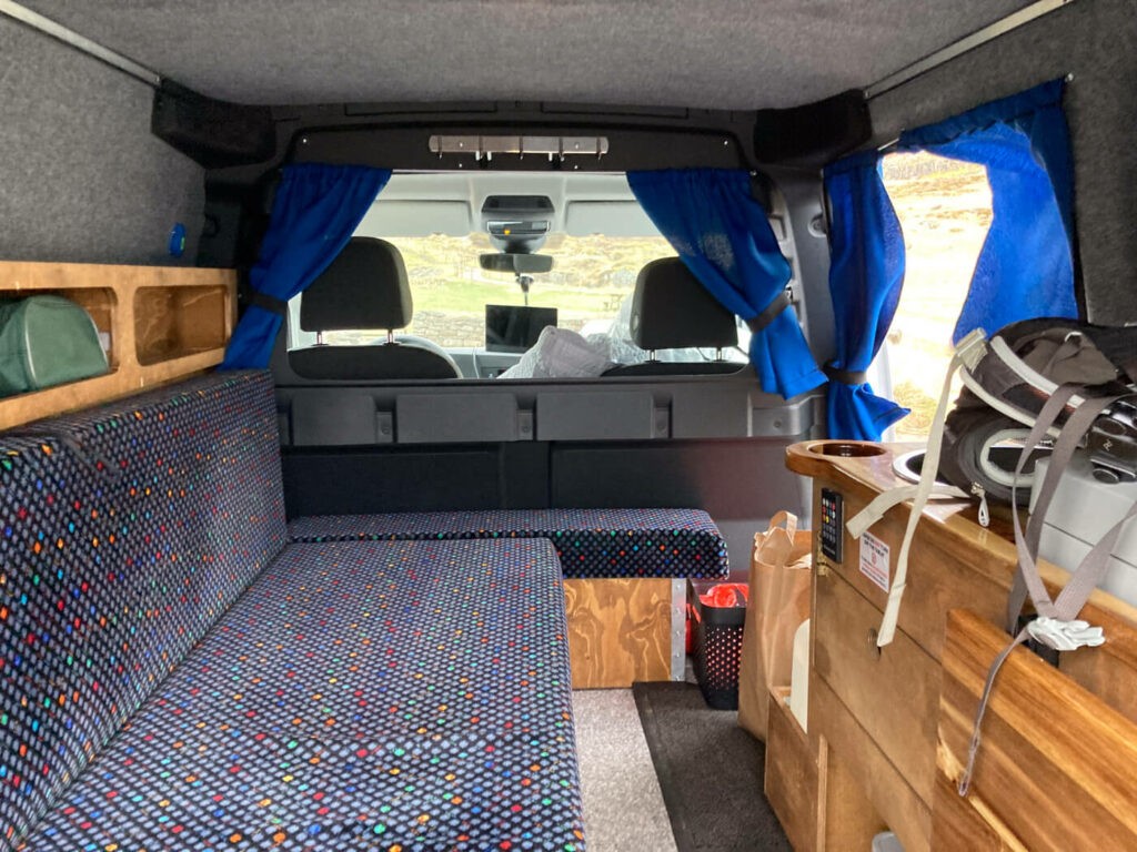 the inside of a caddy campervan used during a ring road trip around iceland.