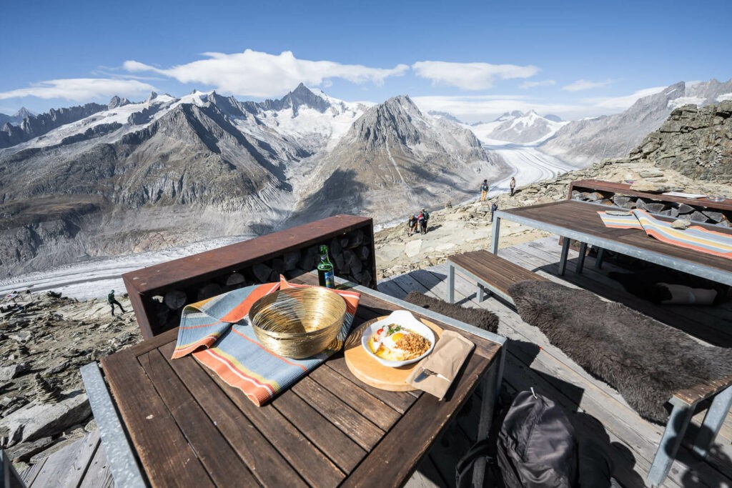 Käseschnitte mit Schinken at the hut in the Aletsch arena overlooking the glacier on a sunny day. 