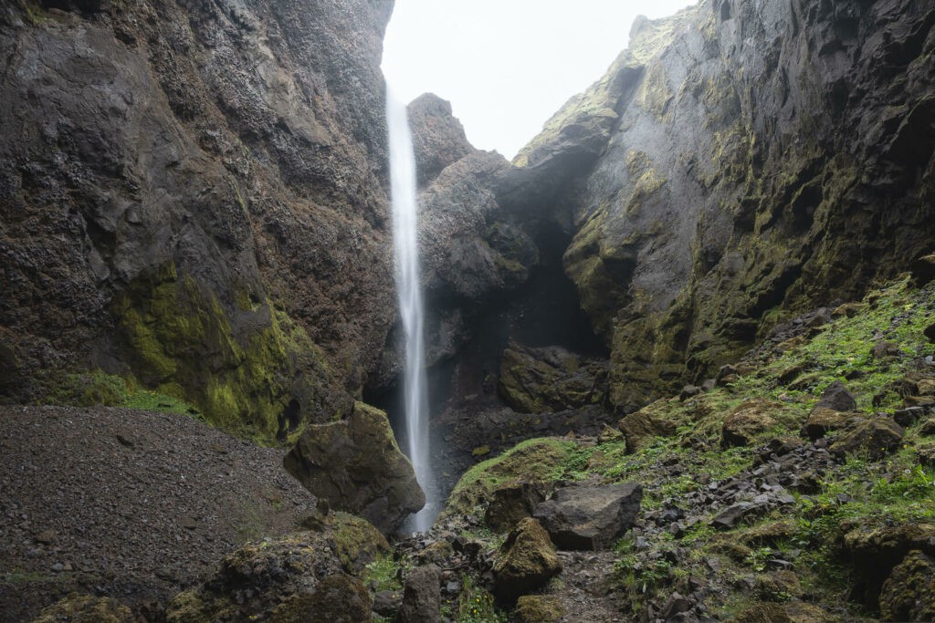 Remundargilsfoss, w tall waterfall at the very end of the remundargil canyon in thakgil