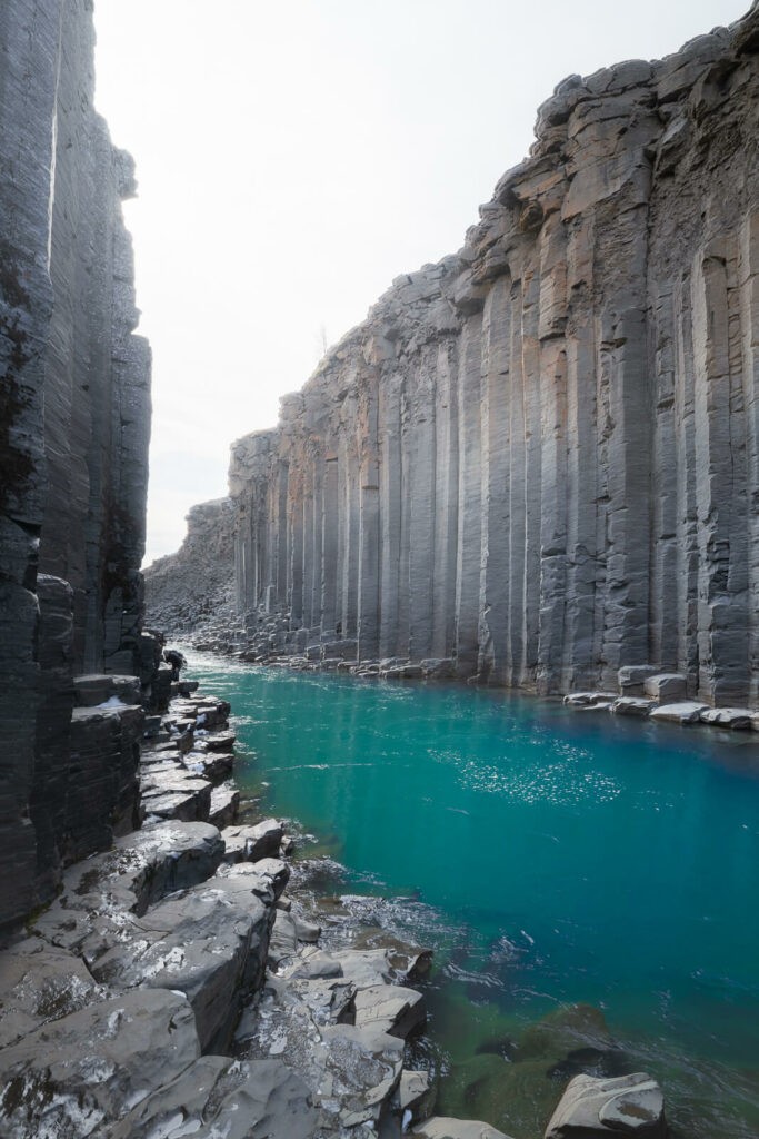 The Sudlagil Canyon with deep blue waters