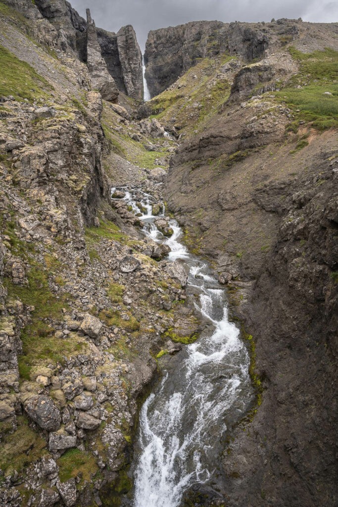 waterfall in a narrow gorge in the westfjords