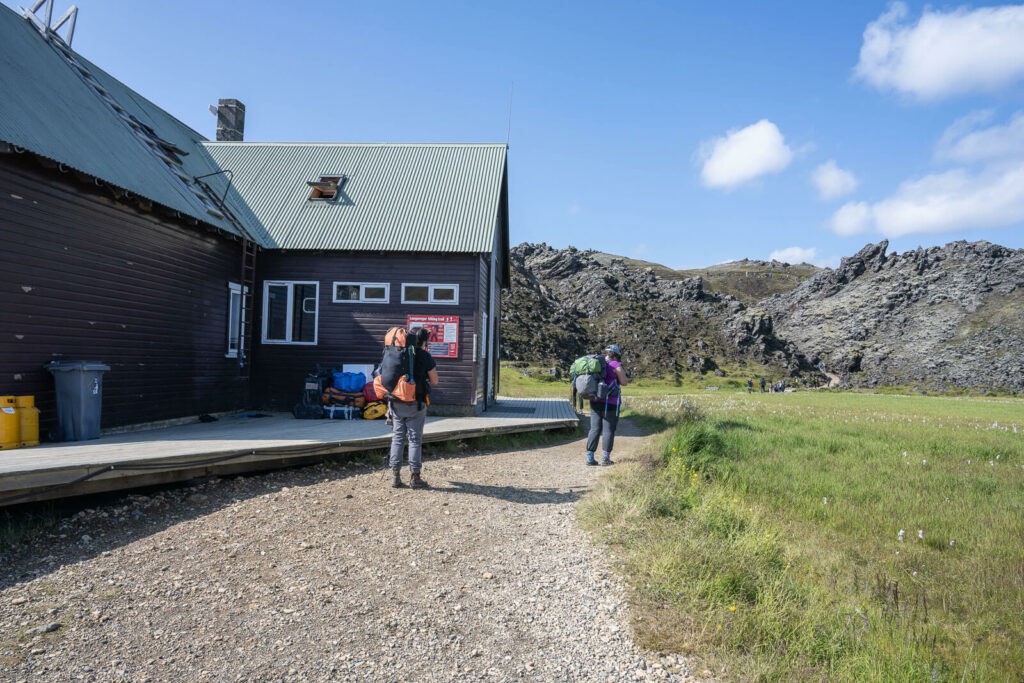 Hikers at the hut in Landmannalaugar preparing for a hike