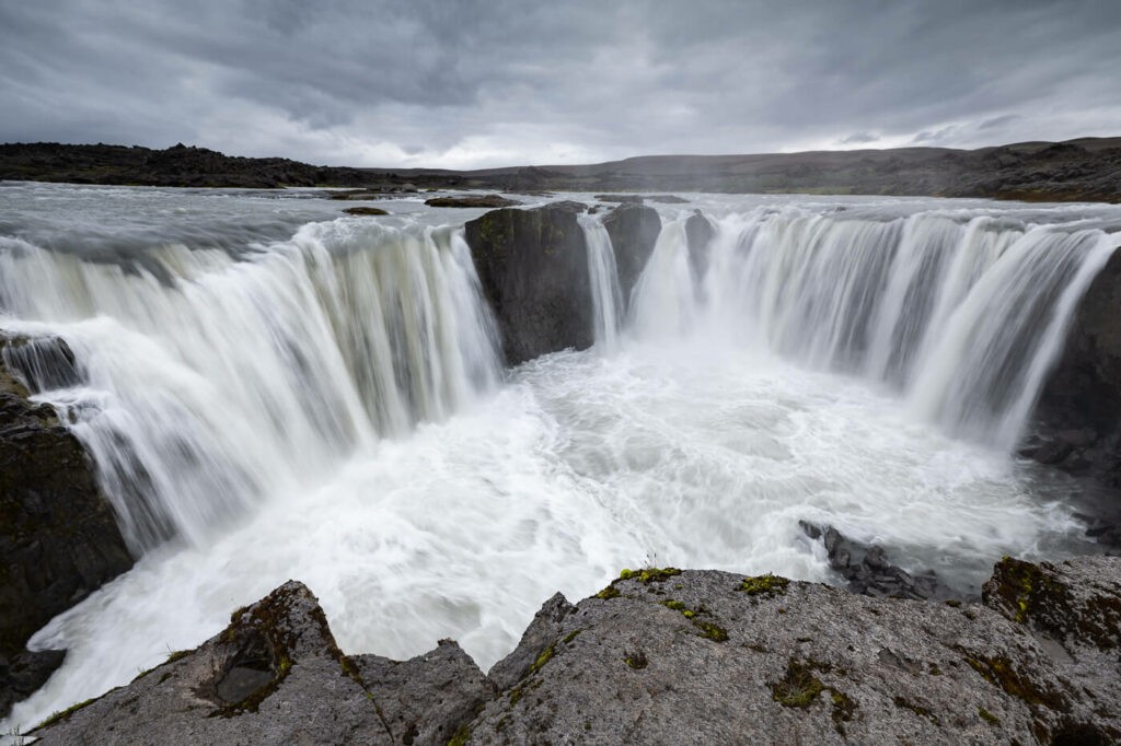 Horseshoe shaped waterfall on a cloudy day in Iceland