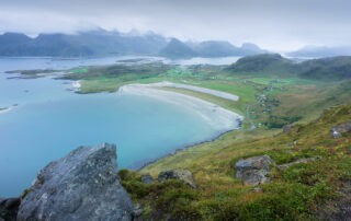 View of Yttersand beach form the top of a mountain on the hike to Røren and Mulstøtinden in the Lofoten Islands