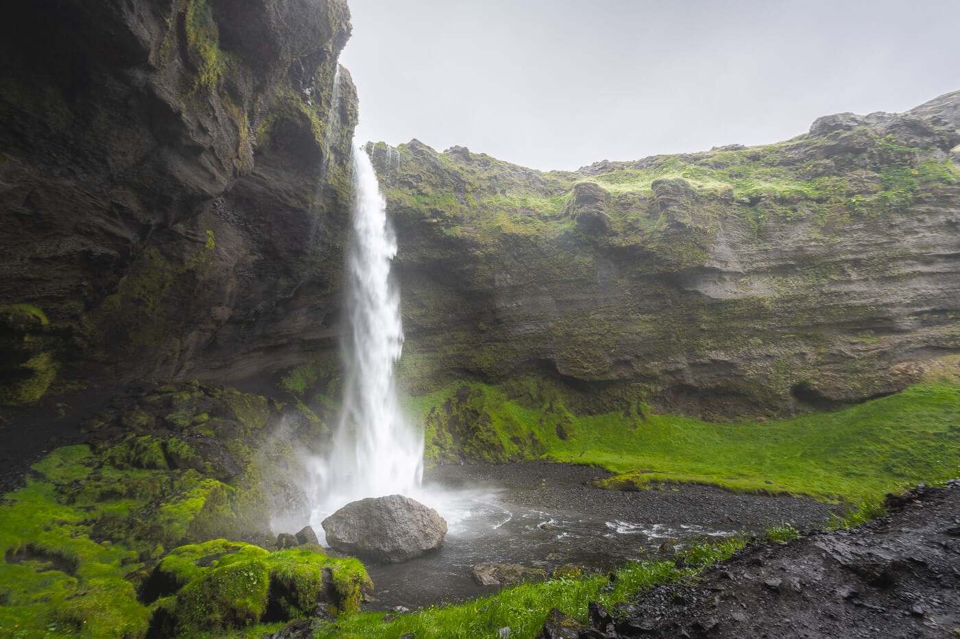 Kvernufoss Waterfall in iceland with some mist around it