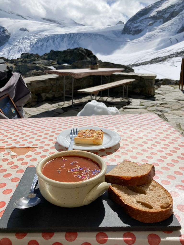 Mood at a mountain hut in Switzerland with view of mountains and glaciers